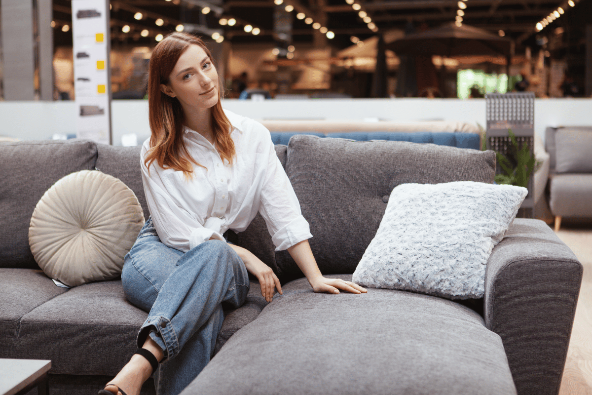 A woman at a discount furniture store