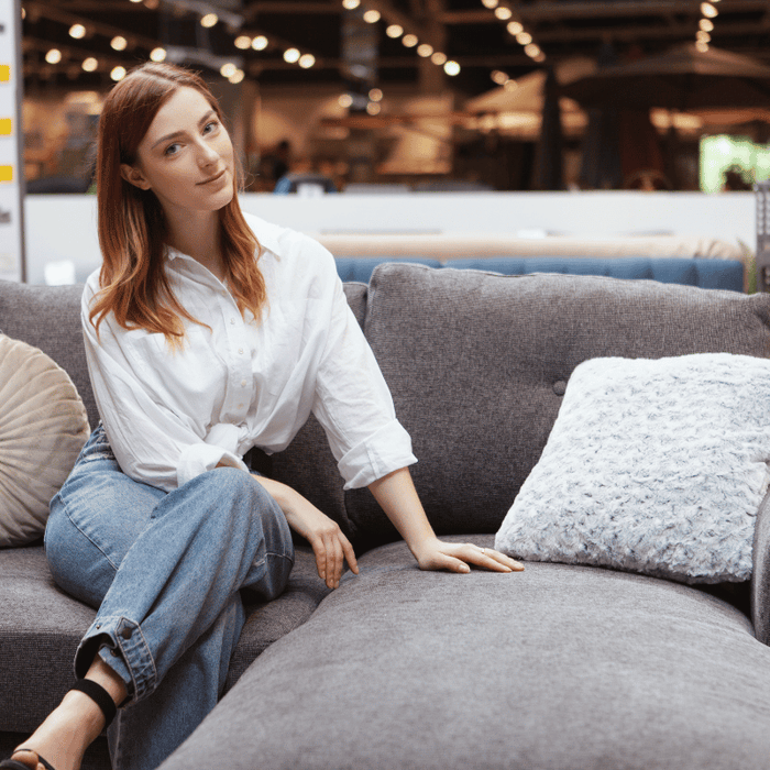 A woman at a discount furniture store