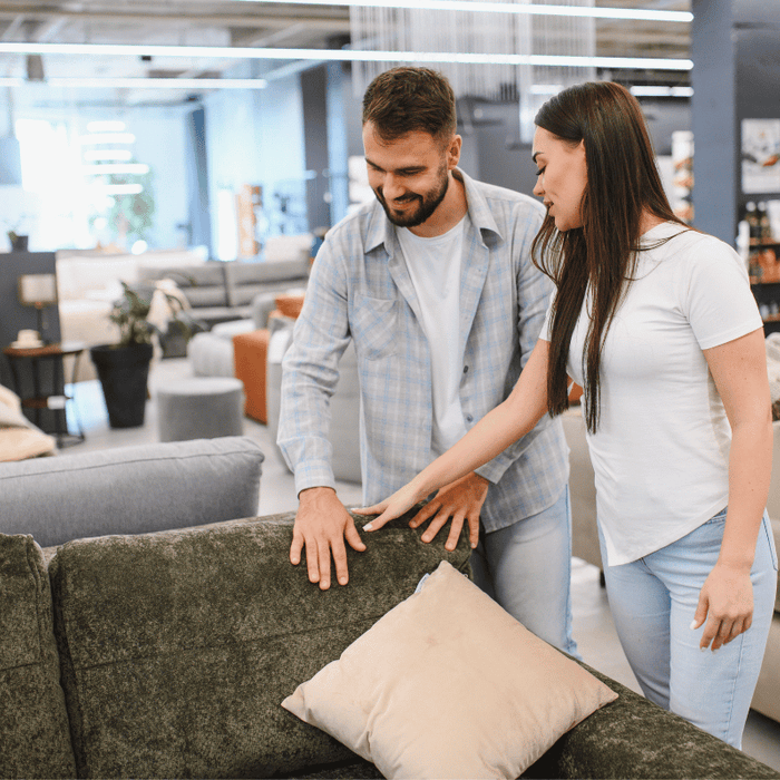 A young couple furniture shopping